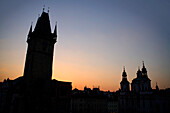 Silhouette of the town Hall and St. Nicholas Church, Old Town Square, Prague, Czech Republic