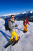 A couple snowshoeing in a winter landscape, Serfaus, Tyrol, Austria