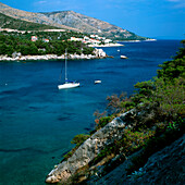 View over Croatian coast area with sailboat, Dalmatia, Croatia
