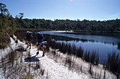 Bushwalkers at Lake Jennings, Fraser Island, Queensland, Australia