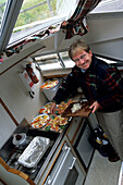 Preparing Salmon Snack, Aboard Carrick Craft Waterford Shannon-Erne Waterway, near Ballinamore, County Leitrim, Ireland