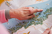 Finger pointing on map