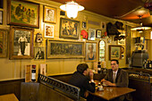 Two men sitting in the restaurant Zum Weissen Kreuz, Zurich, Canton Zurich, Switzerland