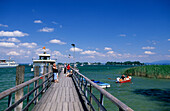 Landing stage at island of Herrenchiemsee with view to island of Frauenchiemsee, Lake Chiemsee, Chiemgau, Upper Bavaria, Bavaria, Germany