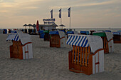 Beach chairs at dusk, Warnemünde, Mecklenburg-Western Pomerania, Germany, Europe