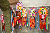 Rose Festival, masks on wall, Karlovo, Bulgaria, Europe