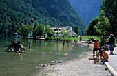 tourists at lake Königssee, St. Bartholomä, Berchtesgaden range, Upper Bavaria, Bavaria, Germany