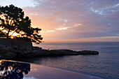 Hotel Maricel and swimming pool at sunrise, Palma, Majorca, Spain