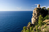 Coastal landscape with medievel watch tower, Mirador de Ses Animes, North Coast, Majorca, Spain