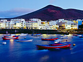 Fishing boats, fishing port, village and volcano, La Restinga, El Hierro, Canary Islands, Atlantic Ocean, Spain