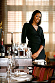 A waitress of the Fahrenheit restaurant, Ritz Carlton Hotel, Georgetown, Washington DC, United States, USA