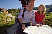 Couple reading map near the Lammersdorfer Hut, 1650 m, Lammersdorf near Millstatt, Carinthia, Austria