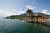 People in the Strandbad Sittlinger, Millstaetter See, the deepest lake in Carinthia, Millstatt, Carinthia, Austria