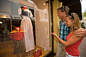 Couple window shopping, Villach, Carinthia, Austria