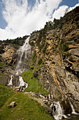 People visiting Fallbach (largest waterfall of Austria), Maltatal, Malta, Carinthia, Austria