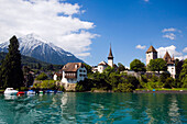 View over Lake Thun to Spiez with castle and castle church, Spiez, Bernese Oberland (highlands), Canton of Bern, Switzerland