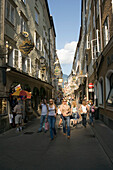 People strolling over Getreidegasse, Salzburg, Salzburg, Austria, Since 1996 historic centre of the city part of the UNESCO World Heritage Site