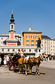 Cap passing Mozart Square with Mozart monument, Salzburg, Salzburg, Austria, Since 1996 historic centre of the city part of the UNESCO World Heritage Site