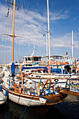 Ships and boats anchoring in Mandraki harbour (translated literally: fold), Rhodes Town, Rhodes, Greece