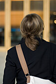 Woman with bag in Leipzig, Saxony, Germany