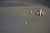 Sand yachts on sandbank, German Bight, Schleswig Holstein, Germany