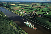 Cargo ship on Kiel Canal, Schleswig Holstein, Germany