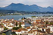 Aerial shot of the river Reuss with chapel bridge, oldest covered bridge in Europe and water tower, Lucerne, Canton Lucerne, Switzerland