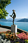 Sculpture Die Tänzerin (chorus girl) in the Raineggrondelle, view to Lake Lucerne, Weggis, Canton of Lucerne, Switzerland