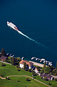View from mountain Bürgenstock (1128 m) to Lake Lucerne with excursion boat, ship station Kehrsiten, Lucerne, Canton Lucerne, Switzerland