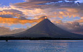 Mayon volcano near Legazpi City, eruption at sunset, Legazpi, Luzon Island, Philippines, Asia