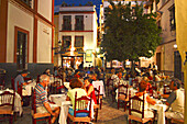 Evening in Barrio Santa Cruz, Boga, Sevilla, Spain
