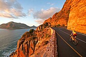 Person on bicycle, Chapmans Peak, Cape Peninsula, South Africa