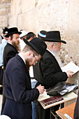 Jewish people praying at the Wailing Wall, Jerusalem, Israel