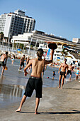 People playing games on the beach, Tel Aviv, Israel