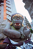 Tempel statue with cloth, Kitamani, Bali, Indonesia