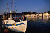 People on a boat in Piran harbour, Piran, Slovenia