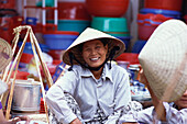 Eine Frau, Marktfrau, Leben in der Stadt, Hoi An, Vietnam