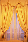 Yellow curtains in Hotel Plaza Athenee, Paris, France