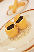 Baked eggs filled with caviar in Restaurant Taillevent, Paris, France