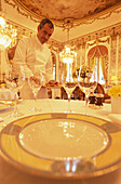 Head chef Marc Marchand serving food, dinner in Restaurant le Meurice, Hotel, Paris, France