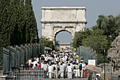 Tourists at the Arch of Titus, Roman Forum, Rome, Italy