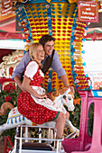 Couple on a fairground ride