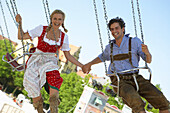Couple in a chairoplane