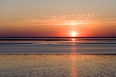 View over North Sea to sunset, Norddeich, Lower Saxony, Germany