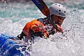 A man is kayaking in wildwater, Boca, Triglav Nationalpark, Slovenia