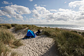 Relaxing in Dunes at Henne Strand Beach, Henne Strand, Central Jutland, Denmark