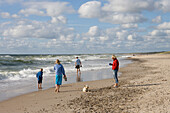 Family with Dog on Henne Strand Beach, Henne Strand, Central Jutland, Denmark