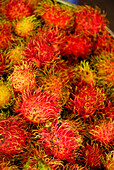 Close up of rambutan fruit at the main market, Phuket Town, Thailand