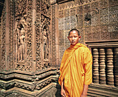Monk at Banteay Srei, complex of Angkor Wat. Angkor. Cambodia