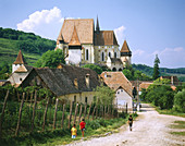 Saxon fortified church of Biertan and village, near Sighisoara. Transylvania. Romania